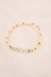 Zusss kralenarmband met tekst smile off white