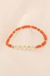 Zusss kralenarmband met tekst happy orange