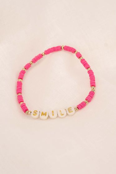 Zusss kralenarmband met tekst smile fel roze